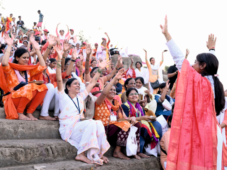 Devotees sharing a spiritual journey along Maa Narmada